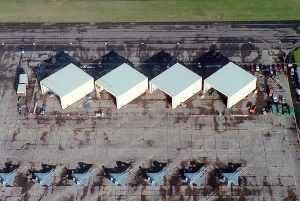 Aerial shot of hangars and fighter jets at the Air National Guard.